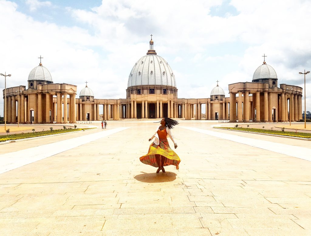 Spinning in front of the Basilica of Our Lady of Peace Cathedral in Yamoussoukro, Cote d'Ivore. During #BreakingBorders